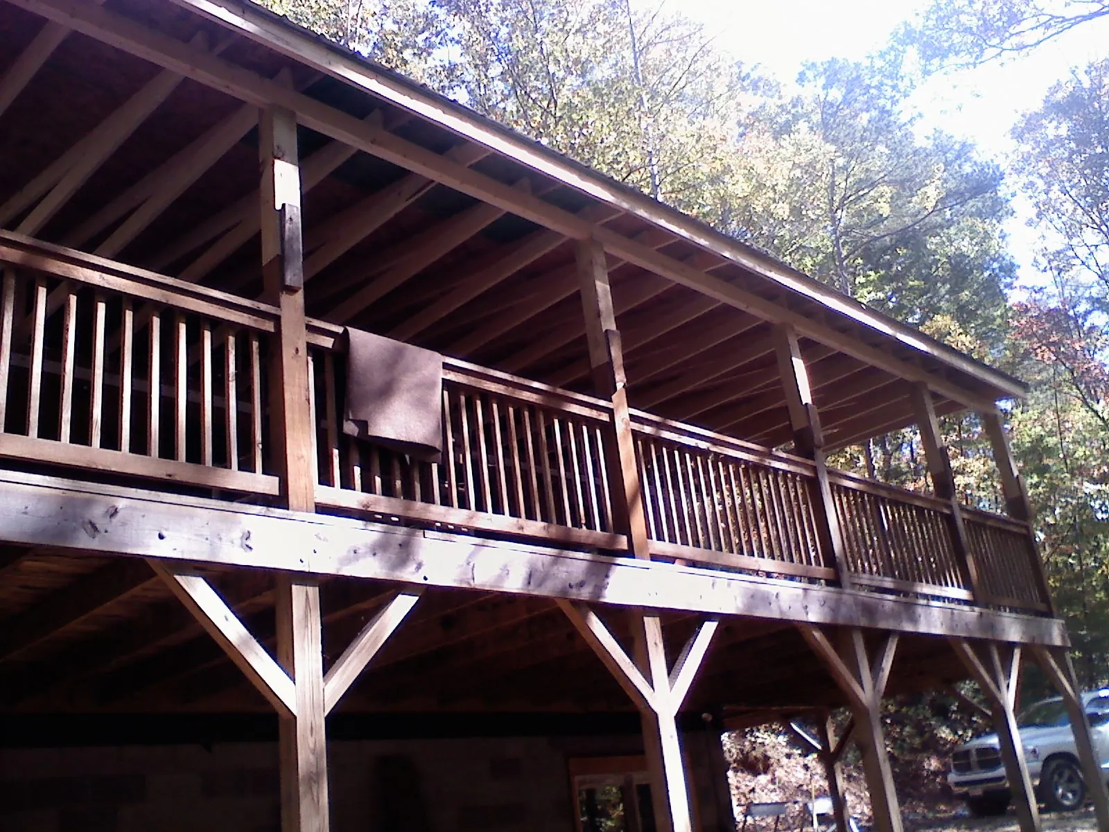 Timber framing under a new elevated porch and deck — Roof Leak Repair in Kaleva by Roofing Brothers